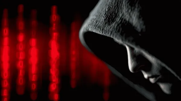 Cyber kriminal, cyber kriminalac, crvena pozadina, cybercrime